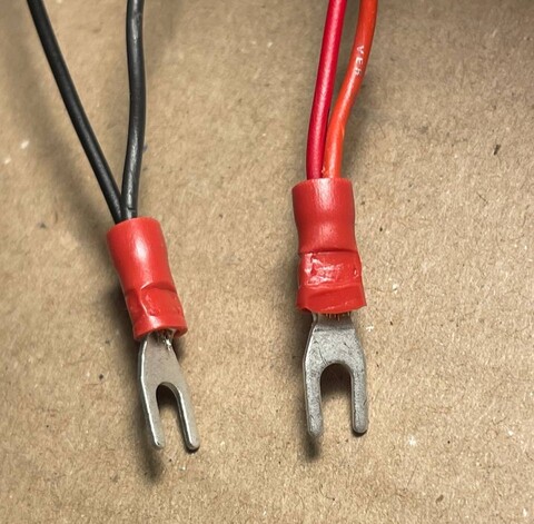 Cash-in and cash-out power wires in fork connectors crushed